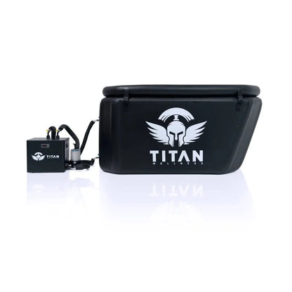 Front view of the TRIUMPH XL cold plunge tub with the TITAN chiller connected on the left—hoses and in-line 20-micron filter visible, black on white.