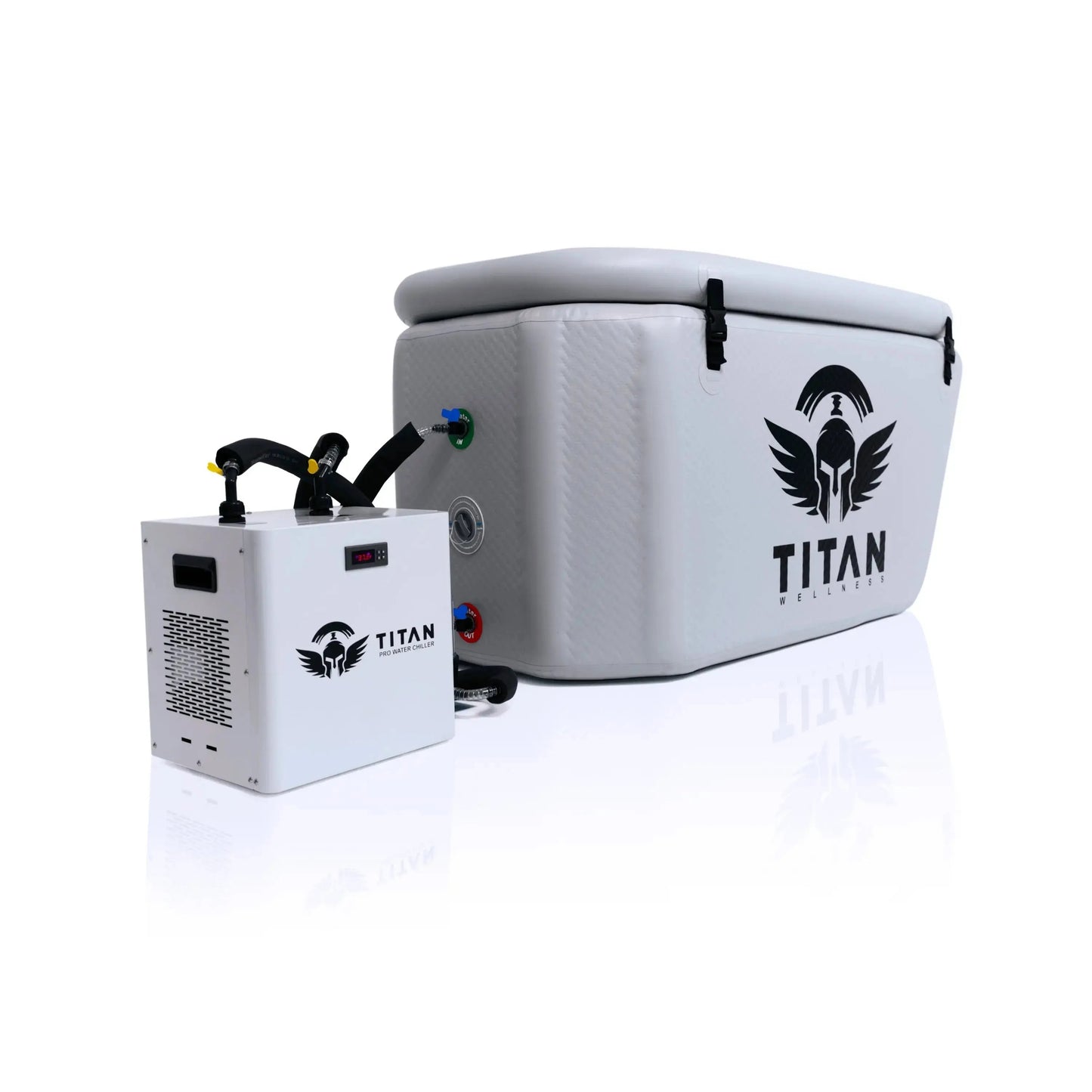 Arctic-white Triumph XL cold-plunge tub with lid closed and large TITAN logo, connected to a matching white Titan 1-HP chiller via side inlet/outlet hoses.