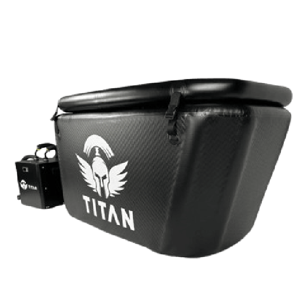 “Side-by-side comparison graphic: on the left, the Titan Triumph cold plunge (black drop-stitch tub with Titan logo and connected chiller); on the right, the larger Triumph XL in the same style; ‘VS’ centered between them.”